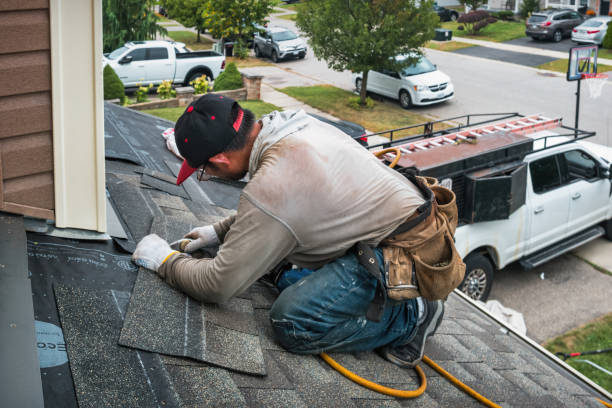 Professional Flat Roof Repair technician working in North Bend, PA